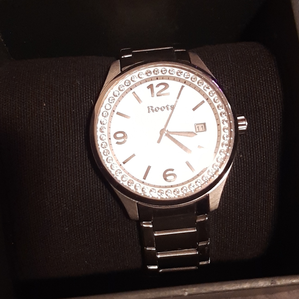 Silver roots watch
